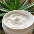 Cream texture with aloe vera background