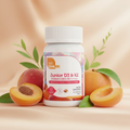 Junior D3 K2 bottle with peaches and apricots on warm background