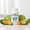 Maxi Lysine Complex with fresh cabbage and citrus on white surface