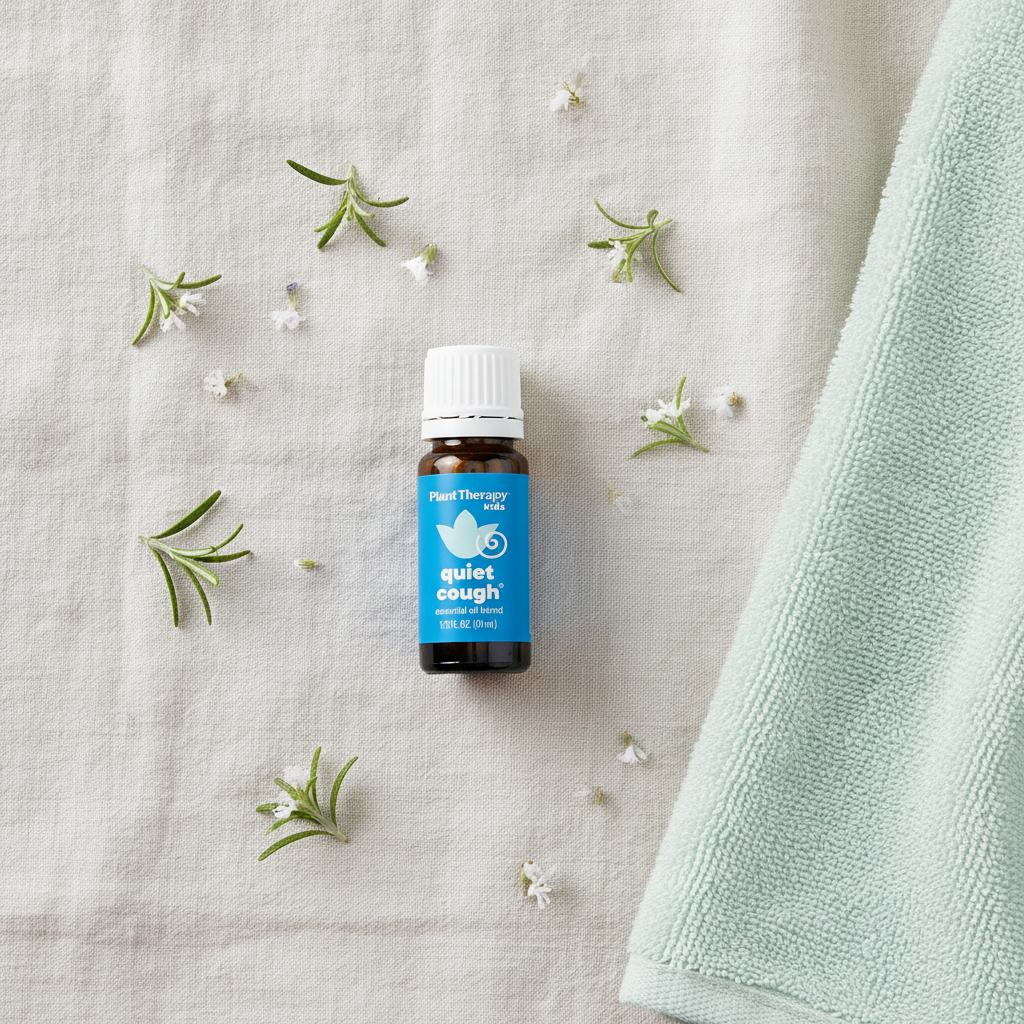 Kids essential oil blend flat lay with botanicals