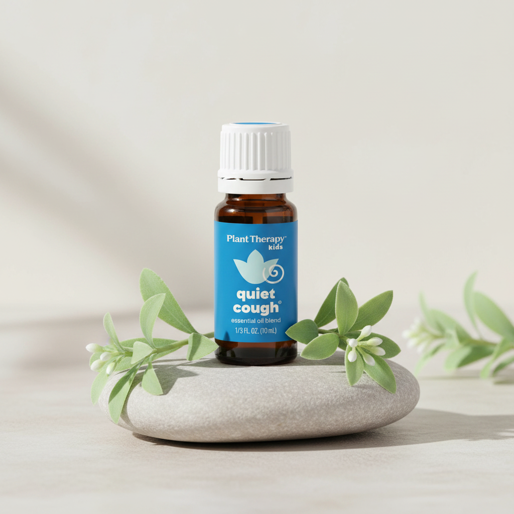 Kids essential oil blend on stone with botanicals