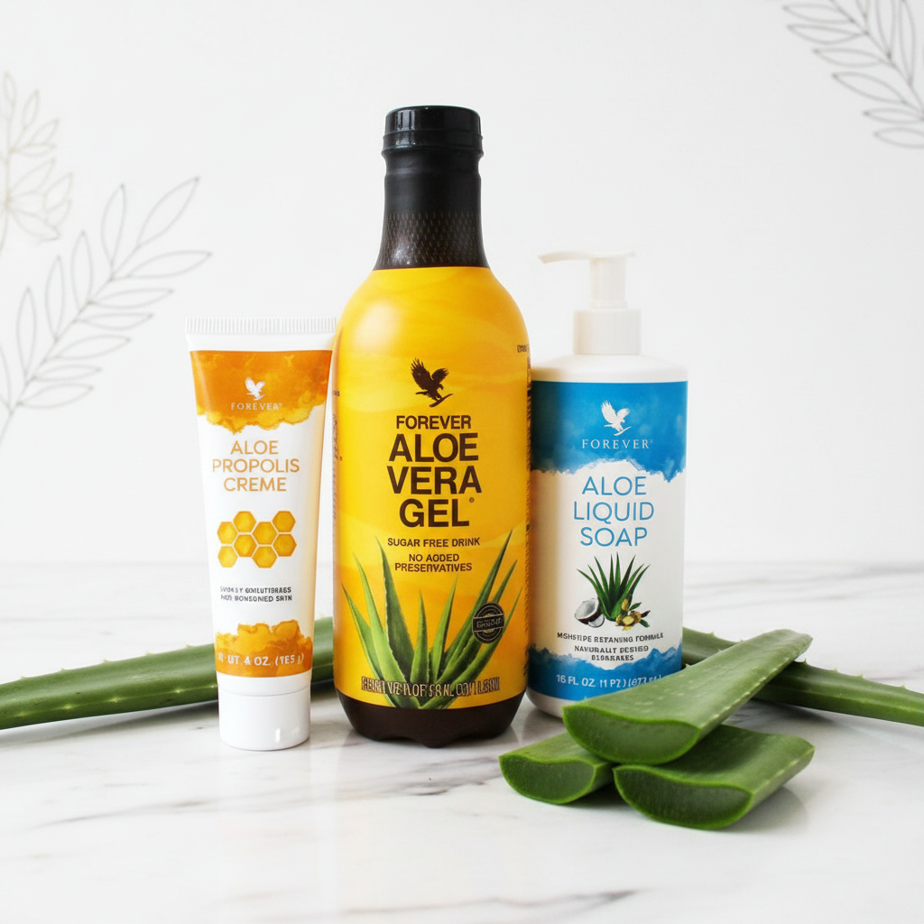 Forever Living Aloe Bundle on white marble with botanicals