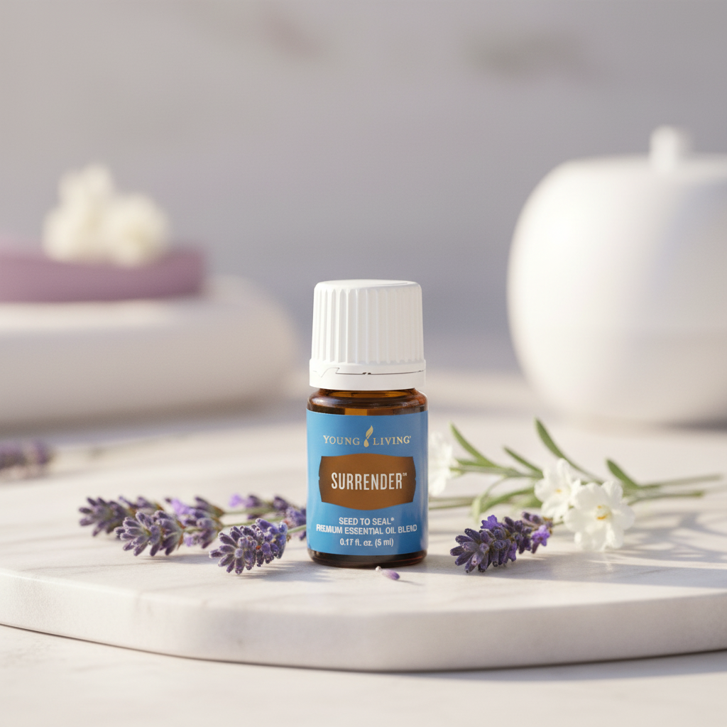 Surrender essential oil on marble with florals